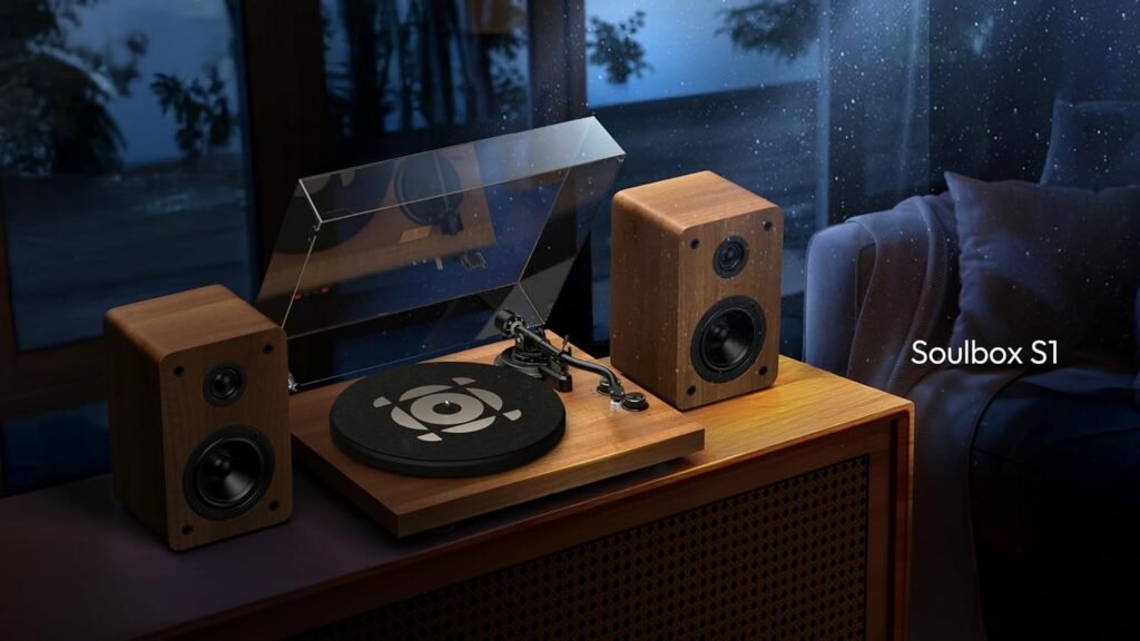 Platenspeler met stereo speakers, ingebouwde voorversterker en S-vormige toonarm voor vin
