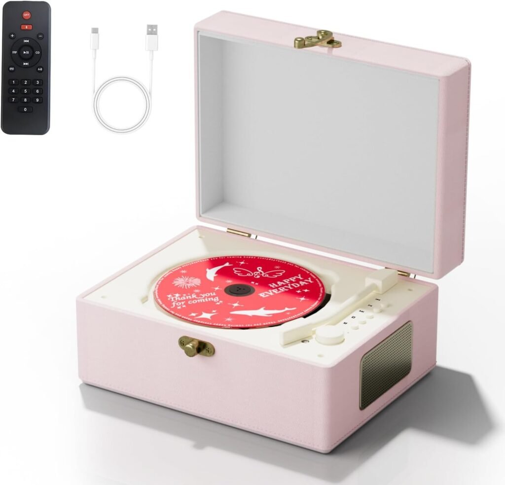 Roze draagbare CD-speler met ingebouwde luidsprekers en tijdinstelling voor thuis en kamerdecoratie
